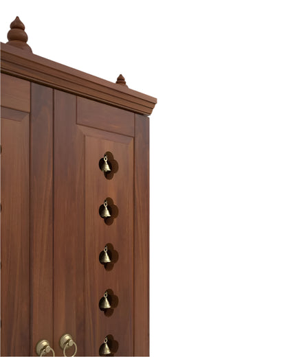 Solid wood handcrafted free-standing temple for home with door in Cherry Brown PU finish accessorized with brass bells & brass lamp